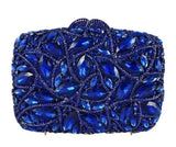 Blue crystal statement clutch featuring brilliant sapphire-blue crystal embellishments and a detachable chain strap.