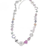 Peace & Love charm choker featuring sparkling hearts, butterflies, evil eyes, Hamsas, horseshoes, smiley faces, stars, and other symbolic charms in gold or silver.