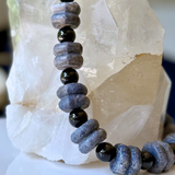 Handcrafted Blue Coral & Black Onyx Statement Necklace featuring organically shaped blue coral and polished black onyx gemstones.