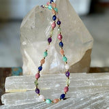 Handcrafted mixed gemstone necklace featuring faceted natural gemstones and premium 14k gold-filled accents.